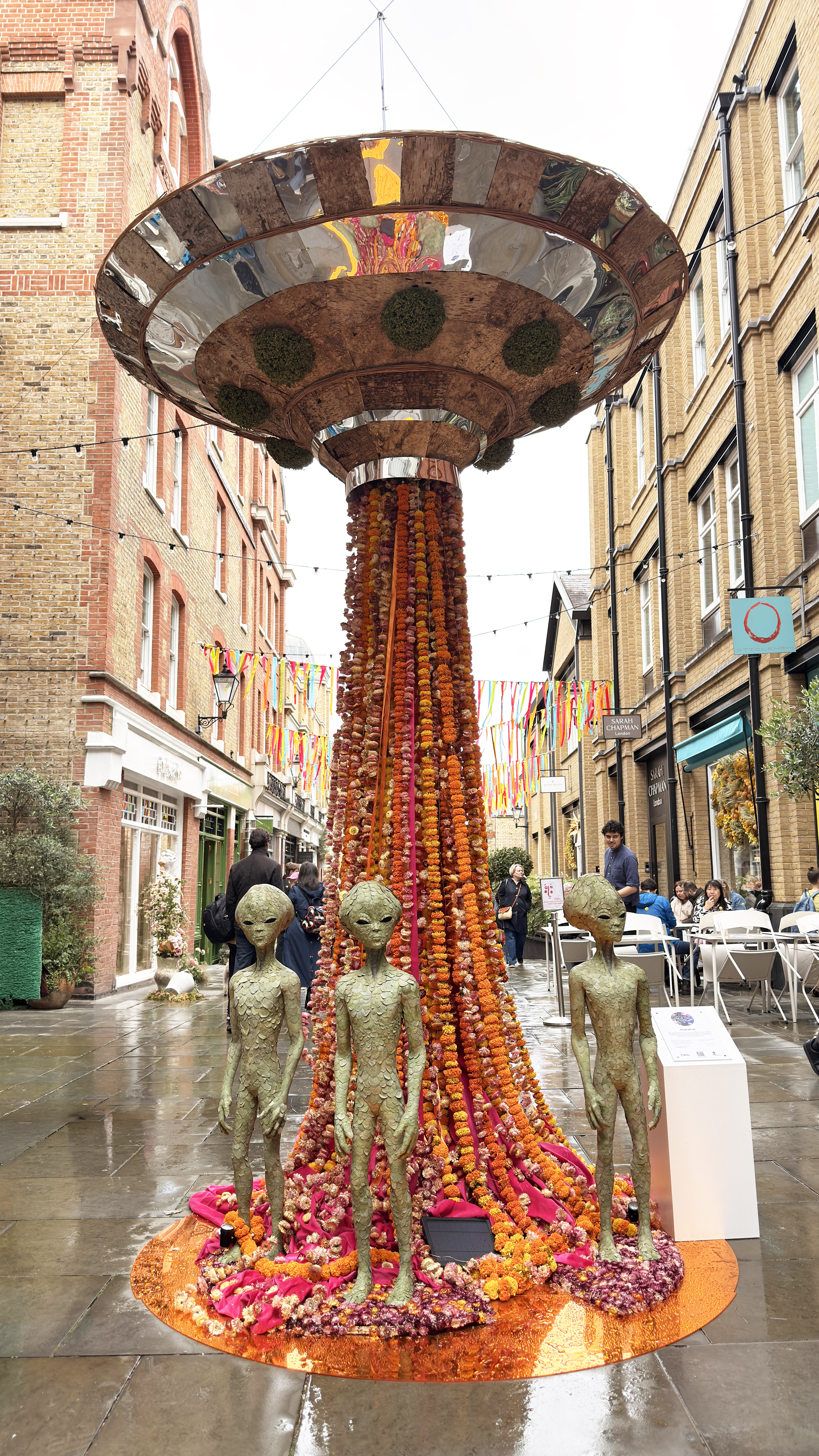 Floral UFO or alien installation at Chelsea in Bloom 2026 demonstrating experiential retail storytelling