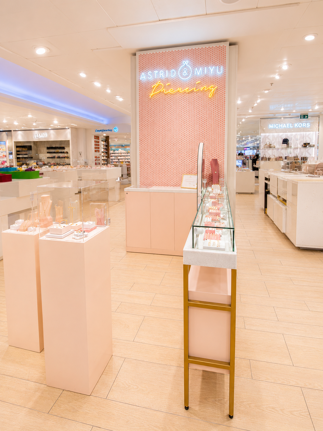 Astrid & Miyu concession positioned within the Selfridges beauty hall, designed to maximise visibility and customer engage